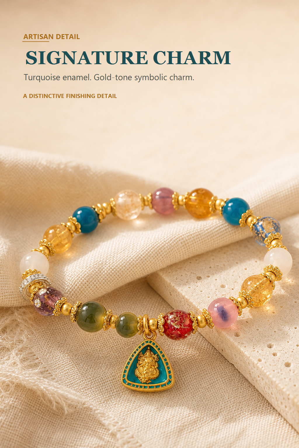 Turquoise enamel and gold-tone symbolic charm on The Abundance & Luck Bracelet